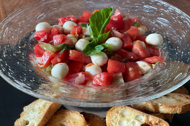 Tomato Salad with Mozzarella pearls (Caprese)