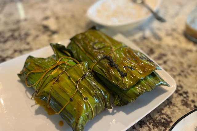 Salmon wrapped in banana leaves